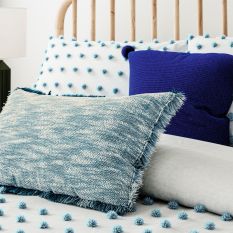 Budding Brights Pom Pom Cushion by Helena Springfield in Navy Blue